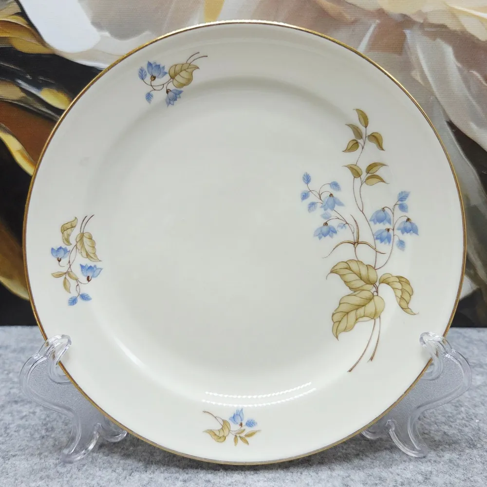 "Rosenthal Porzellanteller mit zarten floralen Motiven (15cm.)